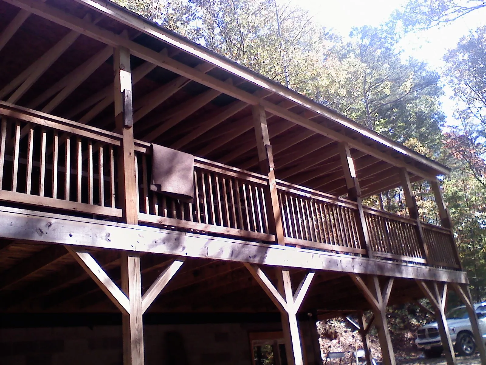 Timber framing under a new elevated porch and deck — Roof Leak Repair in Airway Heights by Roofing Brothers